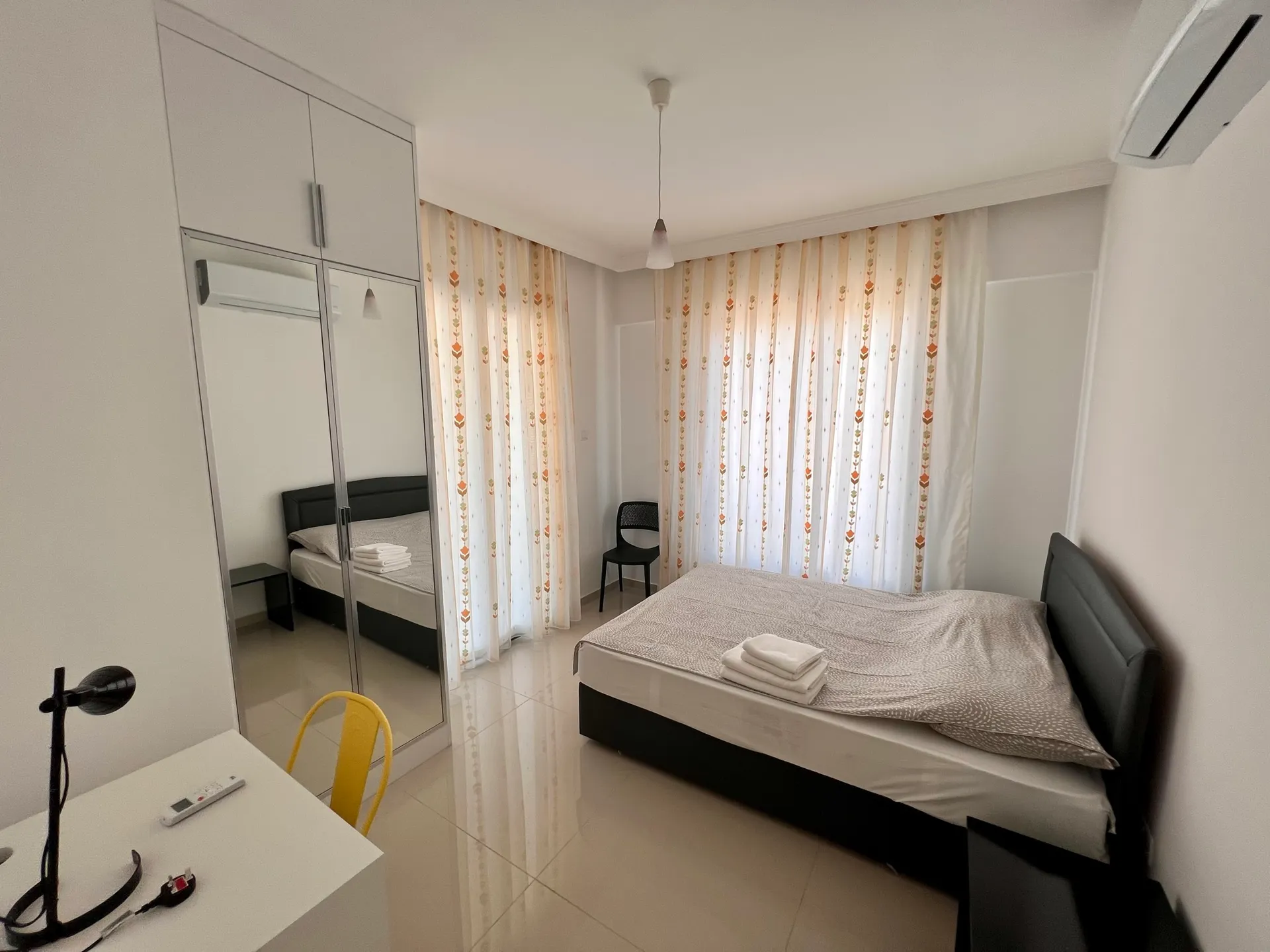 Second bedroom — double bed and desk